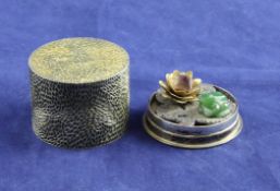 A 1970`s textured silver gilt surprise cylindrical box, by Stuart Devlin, opening to reveal a frog