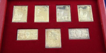 A 1970`s cased set of seven silver gilt replica stamps commemorating the coronation of Queen
