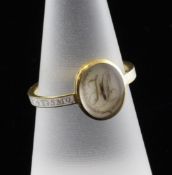 A George III gold memorial ring, with central monogrammed ivory plaque and white enamelled shank