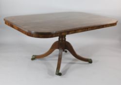 A William IV mahogany and rosewood banded rectangular breakfast table, on turned column and reeded