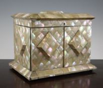 An early 19th century mother of pearl and ivory table top work box, with lid and two drawers