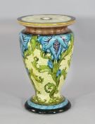 A Mintons Secessionist majolica glazed jardiniere stand, date code for 1898, decorated with Art