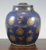 A Chinese gilt decorated blue glazed globular jar and cover, 18th century, decorated with flower,