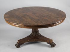 A Victorian banded rosewood circular topped breakfast table, on a turned pillar and flat circular