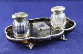 A late Victorian mounted tortoiseshell inkstand, with cusped gadrooned rim, the central stamp