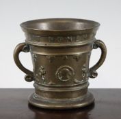 A 17th century German bronze mortar, inscribed, "SIT NOMEN DOMINI BENEDICTUS" (Blessed In The Name),