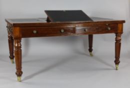 A Victorian mahogany writing table with Queen Victoria inventory stamp, the top inset with four