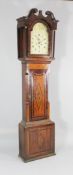 An early 19th century mahogany and oak eight day longcase clock, with shell inlaid case and