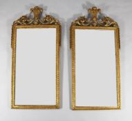 A pair of George III design carved giltwood and gesso rectangular mirrors, c.1850, with Prince of