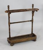A Kohn bentwood umbrella stand, with turned uprights, 2ft 6in. x 2ft 2in.