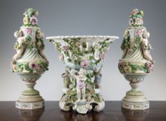 A pair of Paris porcelain vases and covers, late 19th century, each encrusted with flowers and