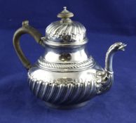 A Victorian silver bachelor`s teapot, of pear shape, with demi spiral fluted decoration, Charles