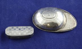 A George III silver jockey`s cap caddy spoon, with engraved wrigglework decoration, makers mark only