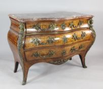 A Louis XV style gilt bronze mounted kingwood and parquetry bombe commode, with marble top above