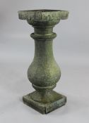 A 19th century granite bird bath from Waterloo Bridge, with accompanying bronze plaque `From