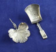 A George III silver leaf shaped caddy spoon, Matthew Linwood, Birmingham, 1808, 2.25in and one other