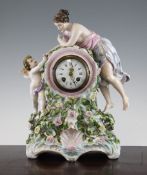 A large Sitzendorf porcelain figural mantel clock, late 19th century, modelled as a classical lady