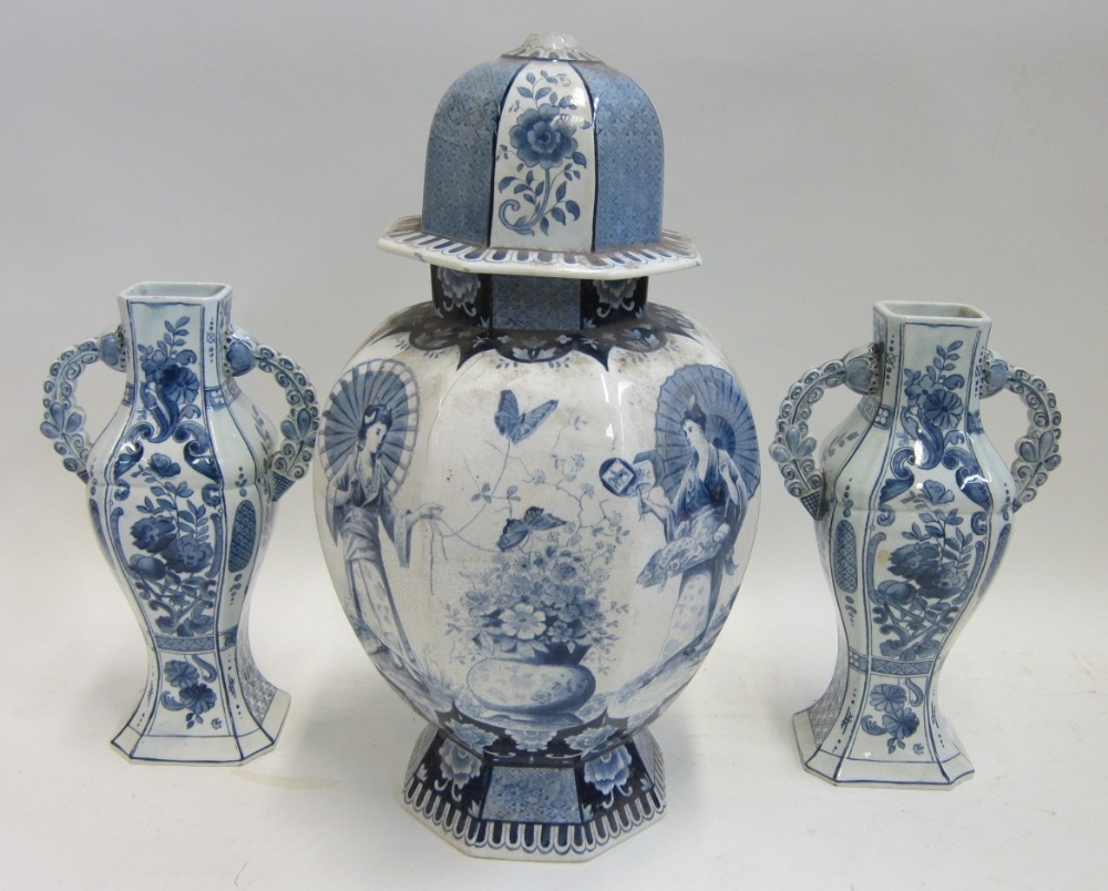 A pair of Villeroy & Boch blue and white twin-handled Vases; together with a large Vase and Cover