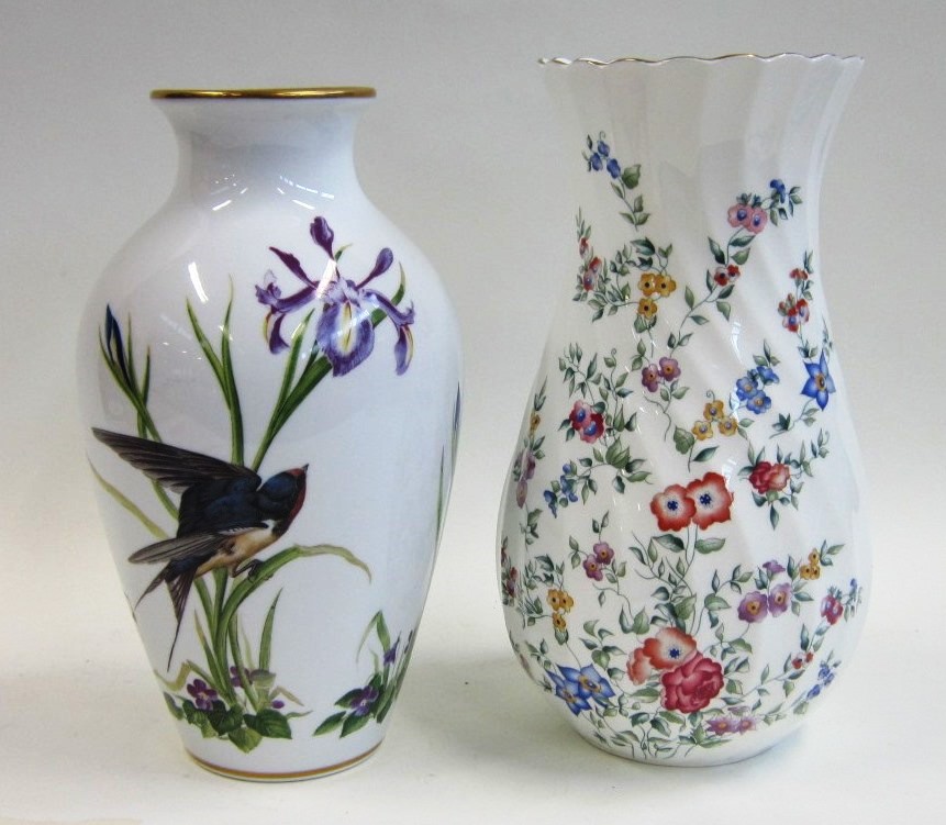 A Wedgwood Avebury pattern Vase with floral decoration and a Franklin porcelain Meadowland Bird