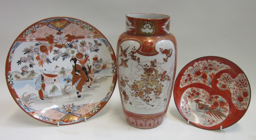 A group of Japanese Kutani wares comprising: a Vase, Charger and Plate, 19th Century and later.