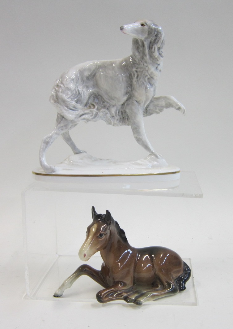 A Royal Worcester model of a Borzoi, modelled by Potts; together with a Beswick model of a foal,