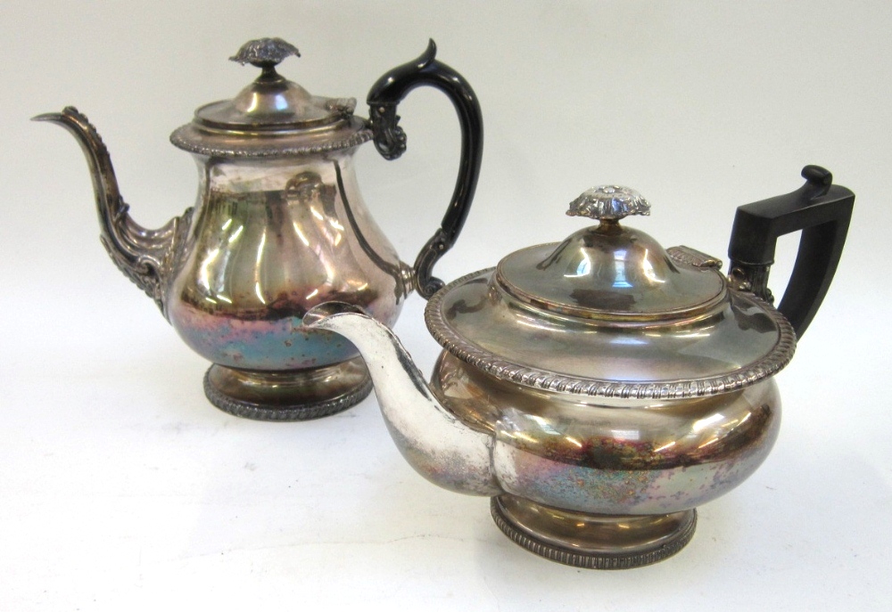 A silver plated Tea Pot and matching Coffee Pot, with gadroon borders and foliate finials (2)