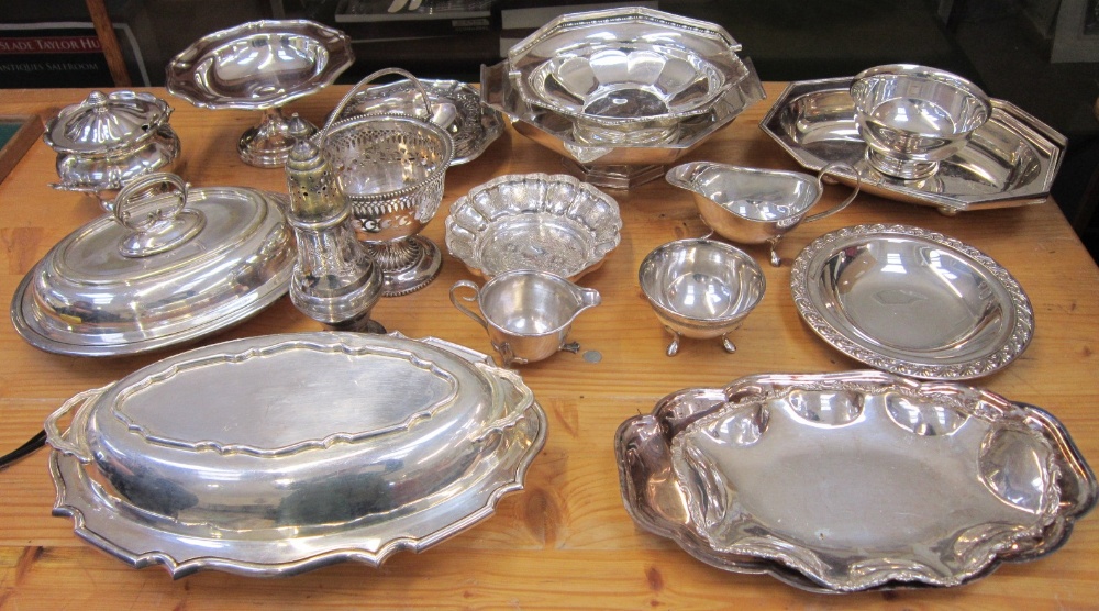 A large group of assorted silver plate to include two Entree Dishes and Covers; Baskets; Dishes etc