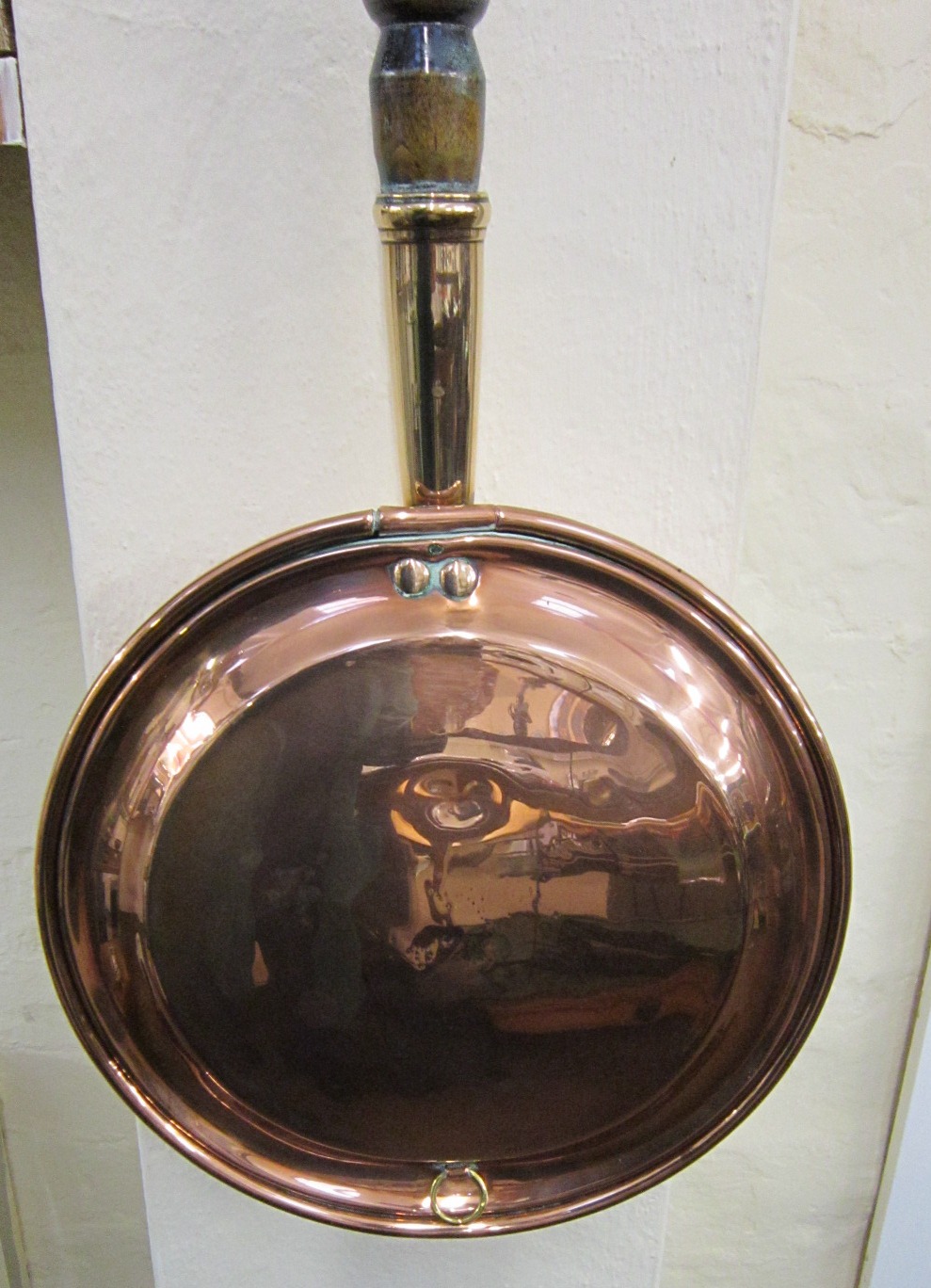 A 19th Century brass and copper Warming Pan with turned wood handle