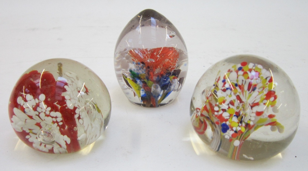 Three similar glass Paperweights with internal multicoloured decoration (3)