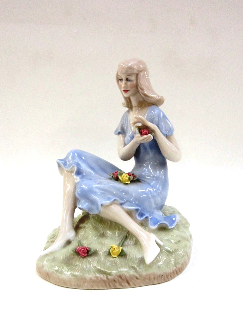 A Royal Doulton Reflections Figure `Summer Rose` No. HN3085, modelled by Eric J. Griffiths