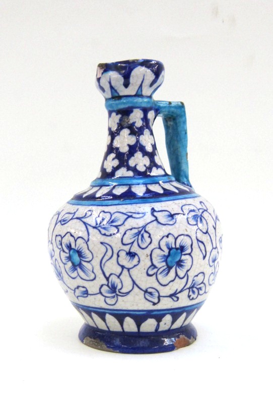 Isnik style blue and white Ewer. 19th Century. 20 cms high