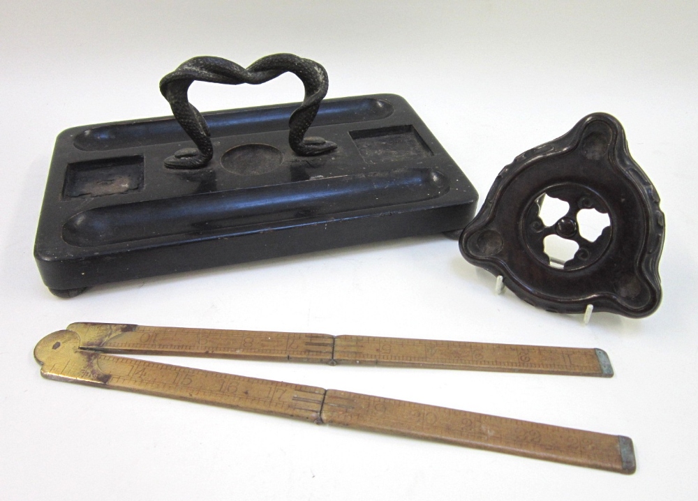 A 19th Century ebonised Inkstand with cast entwined serpent handle (lacking inkwell), together with