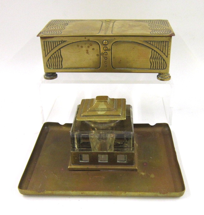 A WMF Art Nouveau polished brass table Cigarette Box, with hinged cover and on four stepped