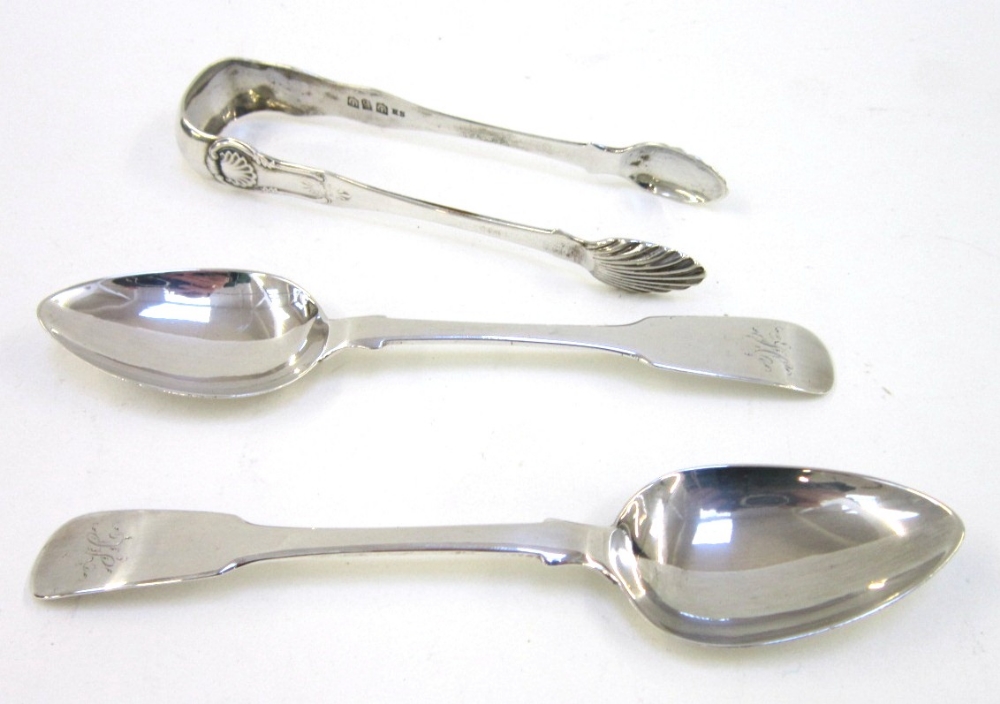 A pair of George III Scottish silver Sugar Tongs. Maker`s mark `SH` incuse, thistle struck twice