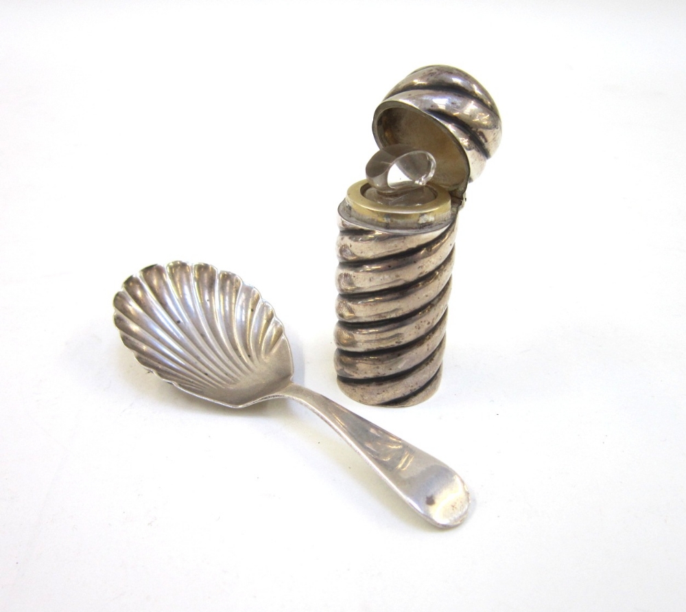 A Victorian silver Scent Bottle. London, 1892. With spirally fluted body and hinged cover; together