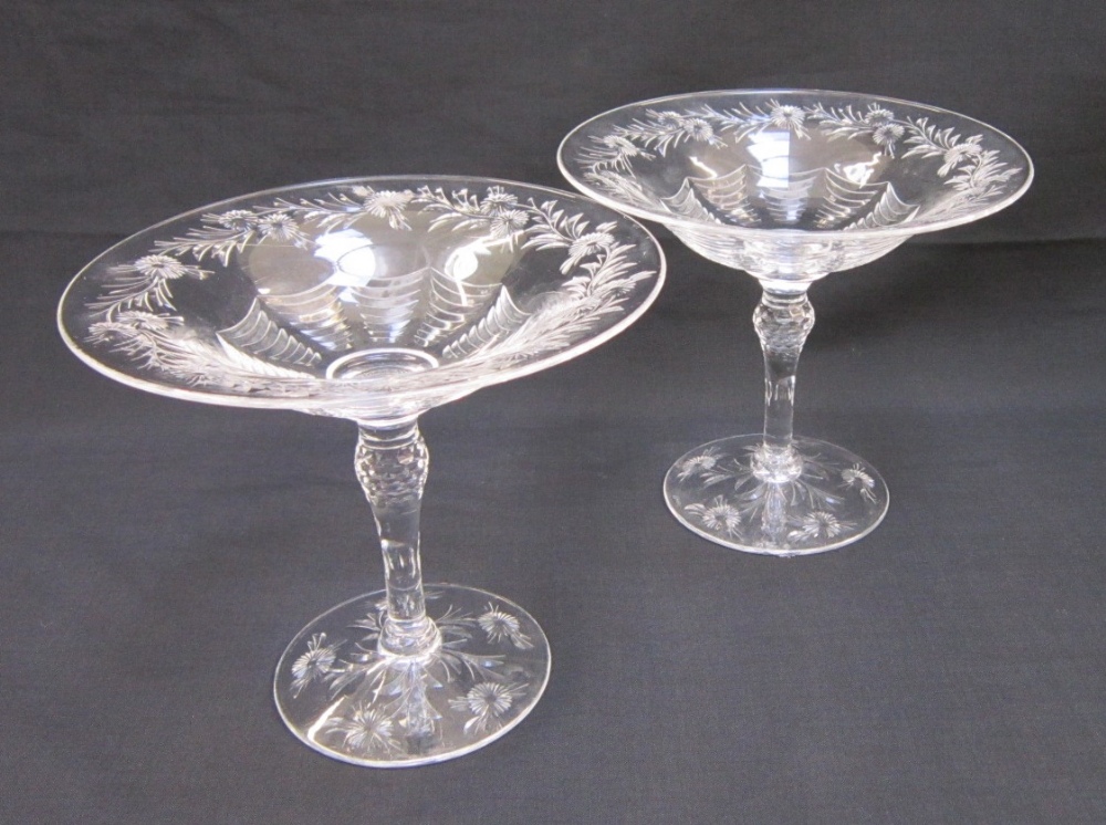 A pair of Stuart Crystal cut glass Comports circa 1930, cut with bands of foliage on baluster stem
