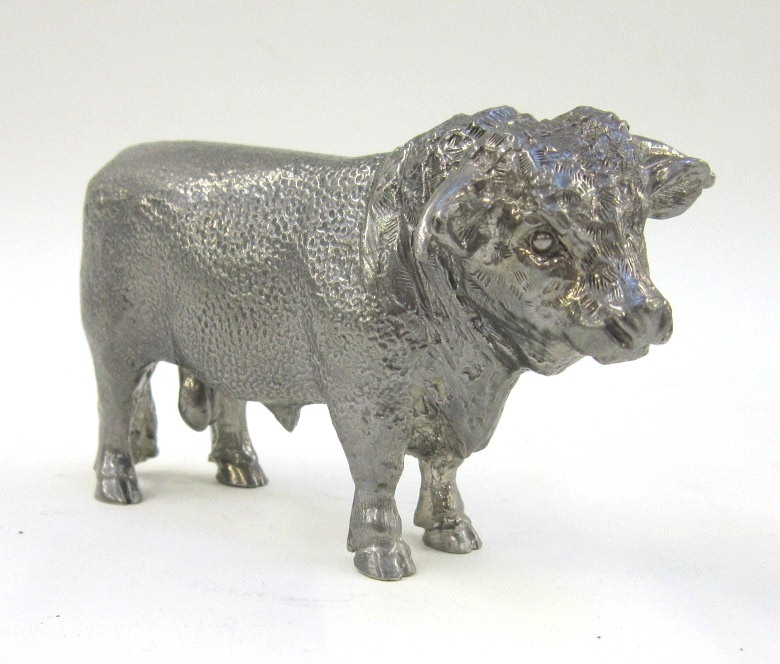 A modern cast pewter model of a Bull