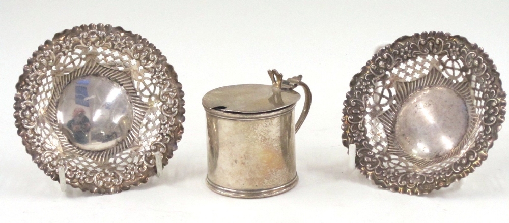 A silver drum Mustard Pot. Chester, 1918. Together with a pair of pierced silver Bon Bon Dishes,