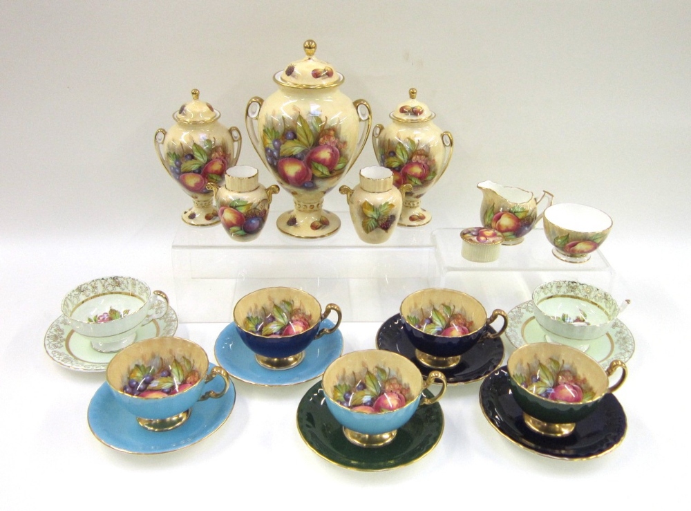 A good selection of Aynsley Teaware and Vases, all decorated with fruit (some damages), the