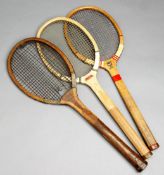 Three tennis racquets by Slazenger, i) "La Belle" circa 1912, concave, two coloured gut, overall
