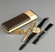 A pair of Football Association gold plated cuff links, the silk lining to the case lid inscribed THE