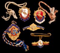 Five gilt-metal & enamel Aintree member`s badges for the Liverpool County Stand dating from the