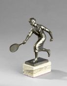 A fine bronze patinated spelter figurine of a 1930s lady lawn tennis player, reminiscent of Helen