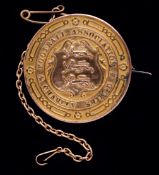 A silver-gilt 1912 Football Association Charity Shield runners-up medal awarded to Dan McKie of