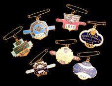 A collection of gilt-metal & enamel 17 Cheltenham racecourse member`s badges, an unbroken run for