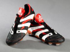 A signed pair of David Beckham boots, black, red & white Adidas boots, signatures to both boots