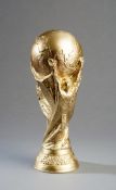 A replica of the World Cup trophy manufactured at the time of the 2002 World Cup, a gilt plaster