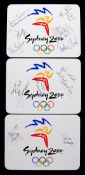 A group of three autographed boxed Sydney 2000 Olympic Games souvenir table mats, i) signed by the