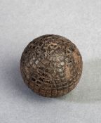 A William Currie patent `Eclipse` gutta percha golf ball circa 1880, reasonable condition, but