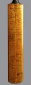 A cricket bat extensively signed by cricketers in 1931, the signatures including the first full